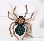 Broche - den sorte enke - edderkop, grøn/guld med glitrende sten